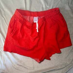 Champion Women's Reverse Weave Cut-Off Shorts in Red, Size Large
